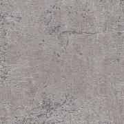 Strukturální vliesová tapeta imituje šedou betonovou stěrku. Kolekce Desert Lodge od německého výrobce tapet A.S.Création