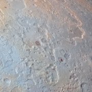 kruhová samolepicí vliesová fototapeta D1-021 - Pluto z kolekce Komar Dots - působivé detaily