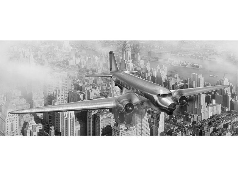 Vliesová fototapeta Letadlo nad městem 375 x 150 cm panoramatická + lepidlo zdarma / MP-2-0006 vliesové fototapety na zeď DIMEX