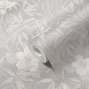 Motiv tropické džungle na plátně, květy a listy ibišku v béžové a šedé barvě, strukturovaný povrch tapety připomíná malířské plátno - vliesová tapeta na zeď od A.S.Création